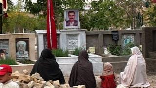 Members of the Hazara community at a Quetta graveyard