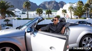 Man in sportscar