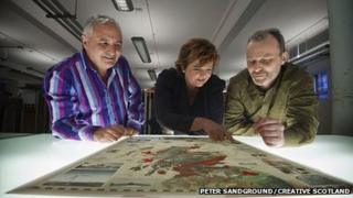 Andrew Dixon from Creative Scotland with Culture Secretary Fiona Hyslop and artist Murray Robertson