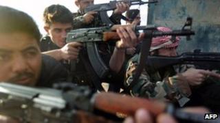 Soldiers of the Free Syrian Army, formed by army deserters, 7 December