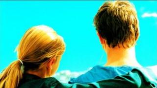 Teenage couple (posed by models)