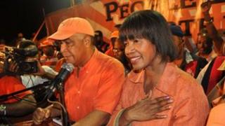 Portia Simpson Miller (R) addresses supporters of the People"s National Party (PNP) on election night, December 29, 2011 in Kingston