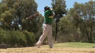 Member of ANC elite plays golf during ANC centenary festivities at Bloemfontein in South Africa on Friday