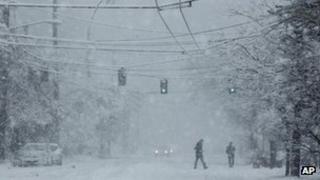 Pedestrians walking through the snow, Seattle 15 January 2012