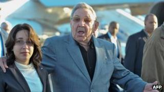 Cuban President Raul Castro (R) gestures at Jose Marti airport, on January 12, 2012