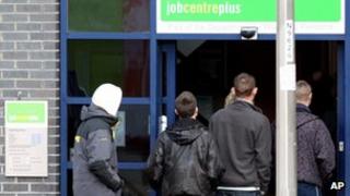 People queuing outside a Jobcentre plus office
