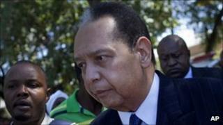 Former Haitian leader Jean-Claude Duvalier leaving court in Port-au-Prince on 20 January 2012