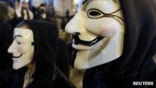 People wearing masks associated with Anonymous (file image)