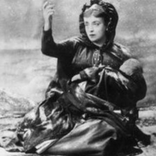 Beggar woman with baby in 1880s,