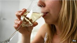 Woman drinking wine