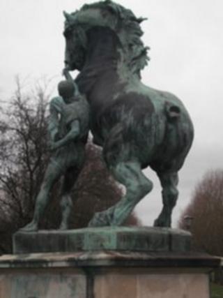 The damaged statue