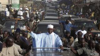 Senegal"s incumbent President Abdoulaye Wade attends an election campaign rally in the capital Dakar February 22, 2012.