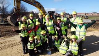 School children joined council officials for the sod cutting ceremony