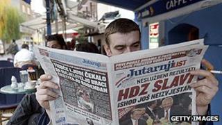 Newspaper reader