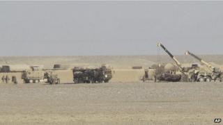 British military vehicles try to recover the Warrior armoured vehicle which suffered "catastrophic damage" in a bomb blast, killing six soldiers