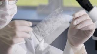 LGC Forensics analysing fibre tape sample