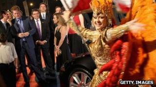 Prince Harry watches samba dancer