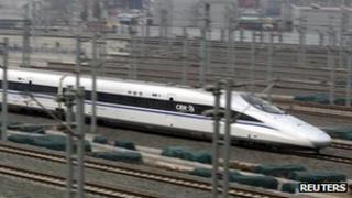 A China Railway High-speed (CRH) Harmony bullet train travels towards Beijing South Railway Station, 24 Feb 2012