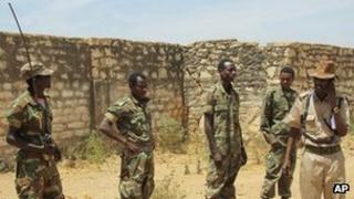 In this Wednesday, Feb. 29, 2012 file photo taken in Somalia, Ethiopian soldiers patrol in the town of Baidoa in Somalia.