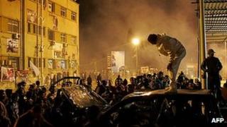 Vehicle belonging to pro-federalism supporters damaged by youths in Benghazi. 16 March 2012