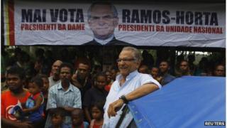 Jose Ramos-Horta smiles as he his seen with his supporters at a market in Ermera district March 12, 2012