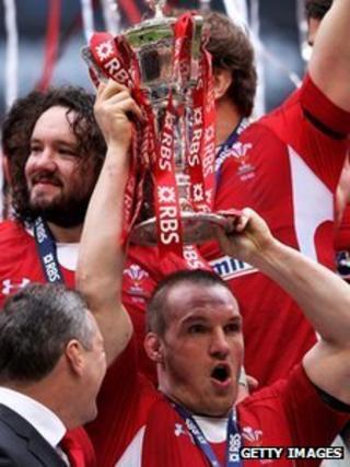Wales prop Gethin Jenkins celebrates with the Six Nations trophy