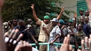 An unidentified leader of the March 22 Popular Movement addresses thousands marching in Bamako in support of Mali's coup leaders