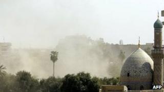 Smoke billows above Baghdad after a blast near the secure Green Zone, 29 March
