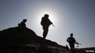 US soldiers on patrol with Afghan troops. 22 April 2012
