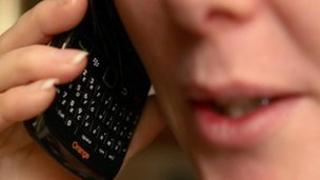 Woman using mobile phone