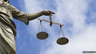 Statue holding scales of justice