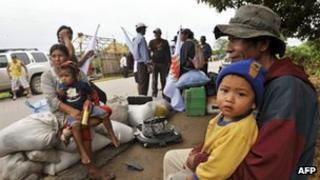 Indigenous Bolivians from Tierras Bajas rest after arriving in Barador, Trinidad, 27 April 2012