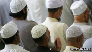 Muslims praying at an east London mosque