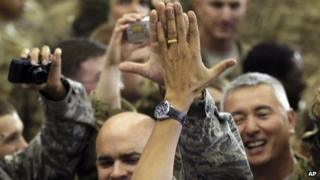 President Obama high-fives military personnel at Bagram air field on 2 May 2012