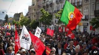 Demonstrators carrying flags, 1 May 2012