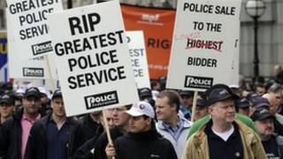 Police Federation members march during a protest in London