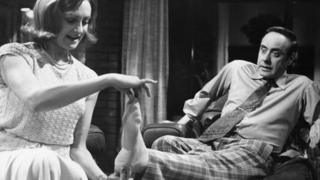 Victor Spinetti as George and Elizabeth Proud as his wife