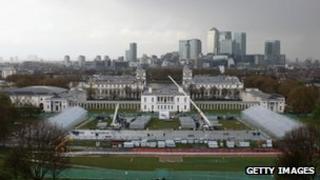Workmen construct grandstands of the Olympic show-jumping arena in Greenwich Park
