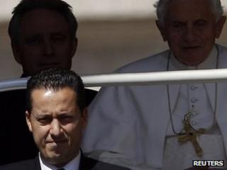 The Pope's butler, Paolo Gabriele (bottom left) arrives with Pope Benedict at the Vatican (23 May 2012).