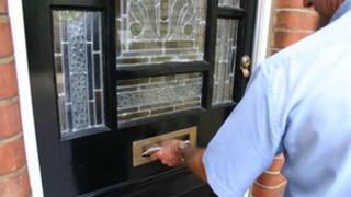 Postman delivering letter