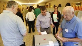 Voters cast their ballot in the special recall election in Wauwatosa, Wisconsin 5 June 2012