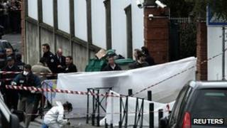 French police inspect outside the Ozar Hatorah Jewish school in Toulouse