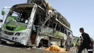 Wreckage of a bus destroyed by the bomb