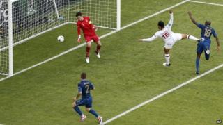 England's Joleon Lescott scores the opening goal past France goalkeeper Hugo Lloris.