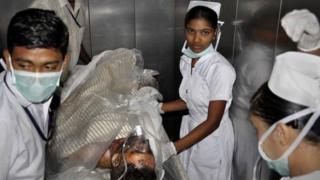 An injured employee of the steel plant is being taken to a hospital in Visakhapatnam