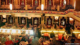 Customers take dinner in the Paramount Hall in Shanghai
