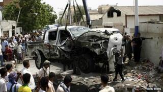 Wreck of car after suicide attack in Aden