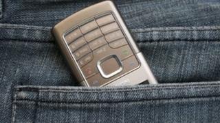 Mobile phone in pocket