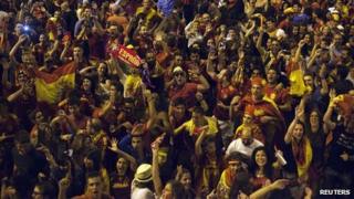 Spanish soccer fans in Madrid celebrate Spain's victory over Italy in Euro 2012 final.
