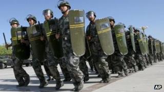 Members of the militia, a civilian reserve force under China's military, in an anti-terrorism exercise in Hami, in northwestern China"s Xinjiang region, 28 June, 2012